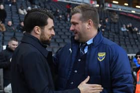 Russell Martin and Karl Robinson when the sides met last season