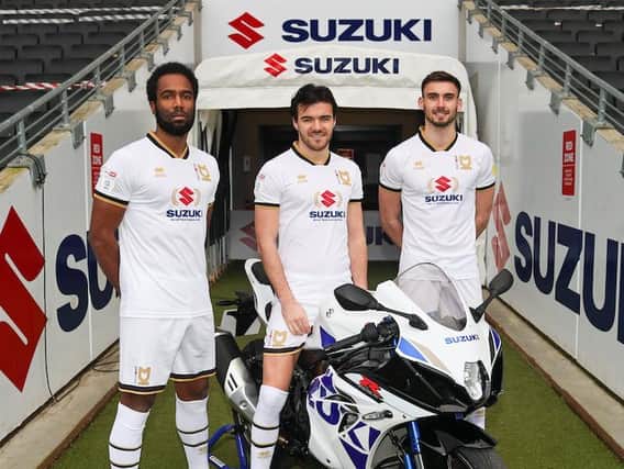Cameron Jerome, Scott Fraser and Warren O'Hora show off the special Suzuki kit