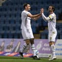 Warren O'Hora celebrates his goal with Will Grigg