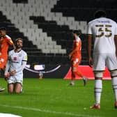 Will Grigg came close to converting after Cameron Jerome's effort hit the bar