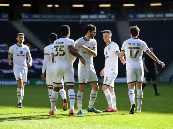 MK Dons celebrate the opener against Accrington on Saturday