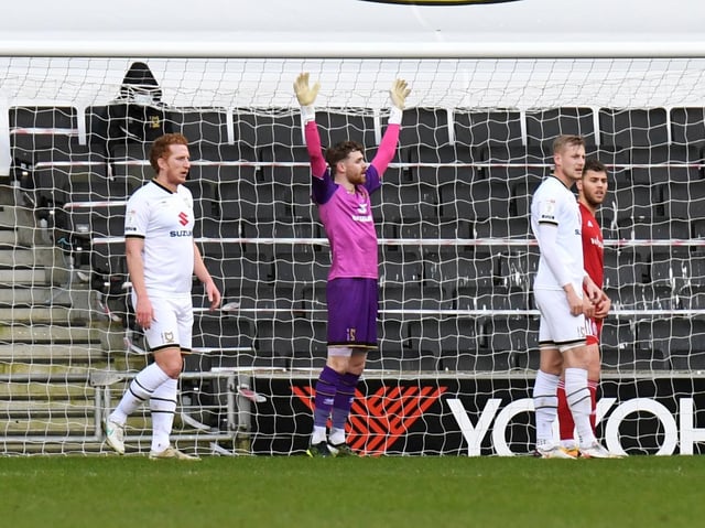 MK Dons defending a corner