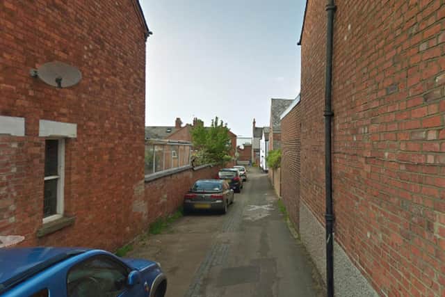 The victim was walking along the alleyway between Stratford Road and Church Street towards Wolverton Evangelical Church when he was approached by two men