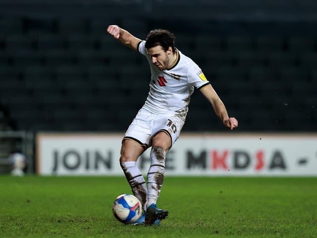 Scott Fraser fires in Dons' late penalty to beat Plymouth
