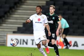Ethan Laird struggled on into the second half despite a shoulder injury