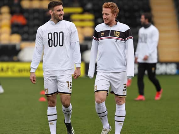 Dean Lewington with Warren O'Hora as he marked the captain's 800th appearance