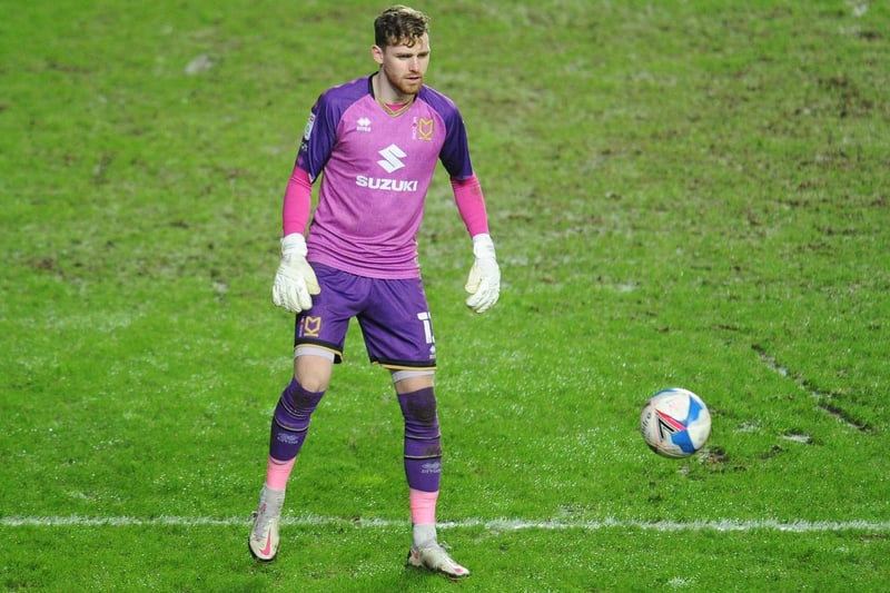 Untroubled for the most part and strong with his feet. Made a remarkable double-save despite the offside flag, but little he could do about Akins' penalty. Took flack late on from the bench for not organising his defenders.