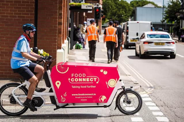 The food is delivered by e-bike