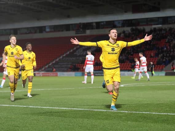 Alex Gilbey celebrates his goal against Doncaster