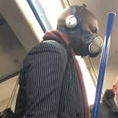 This man was not taking any chances - but his fellow commuter didn't seem impressed. Photo: Twitter