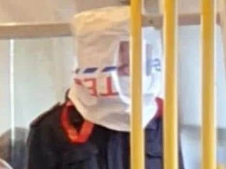 Who needs a face mask when you have a Tesco bag? Photo: Twitter