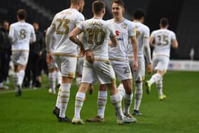 Callum Brittain with strikers Rhys Healey and Carlton Morris