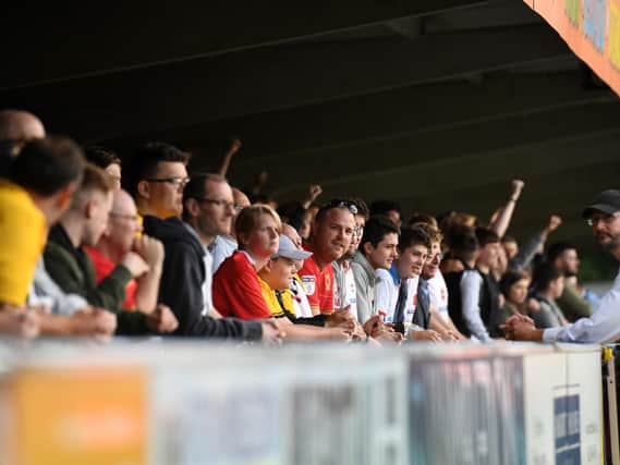 MK Dons fans at the Cherry Red Records Stadium