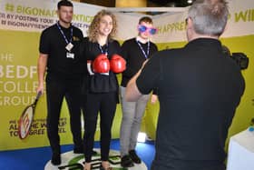Staff from The Bedford College Group testing out the 360 degree photo stand looking at the Matrix style results