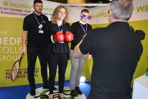 Staff from The Bedford College Group testing out the 360 degree photo stand looking at the Matrix style results