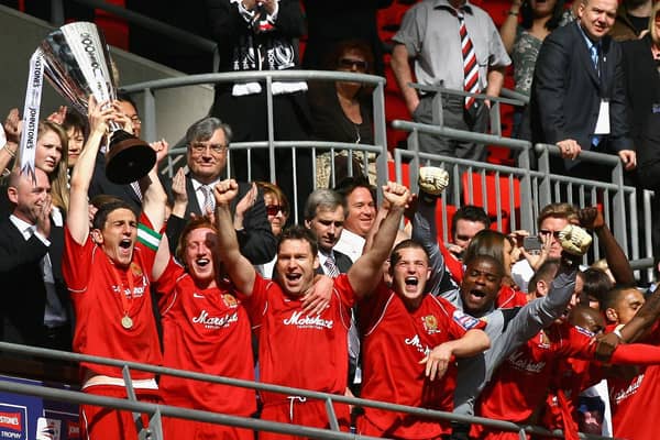 Keith Andrews lifts the Johnstone's Paint Trophy at Wembley Stadium in 2008