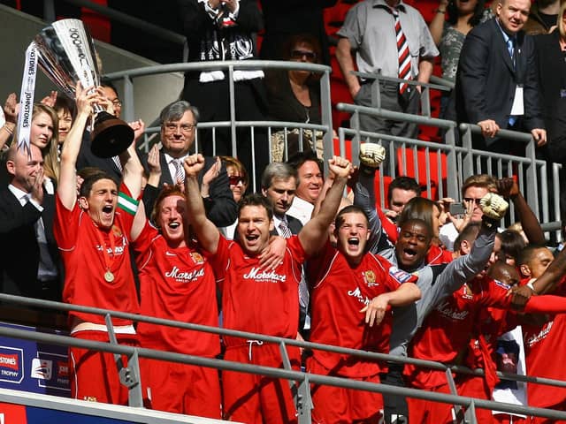 Keith Andrews lifts the Johnstone's Paint Trophy at Wembley Stadium in 2008