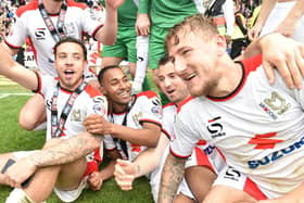 Antony Kay celebrates with Samir Carruthers, Rob Hall and Kyle McFadzean