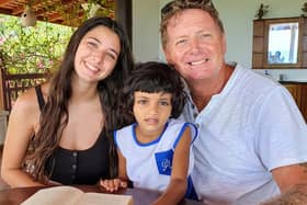 Sophie and Al with a local child