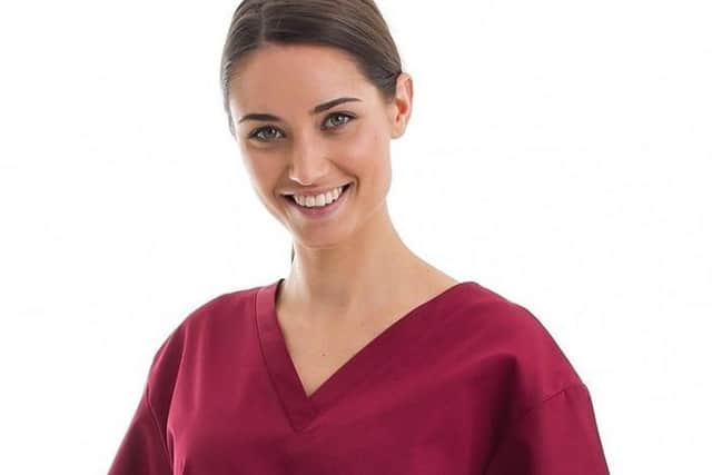 Each set of scrubs costs 5 in material