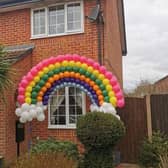 Passers by love the rainbow