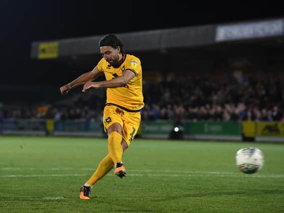 Russell Martin scored a penalty in the shoot-out in the Carabao Cup against AFC Wimbledon