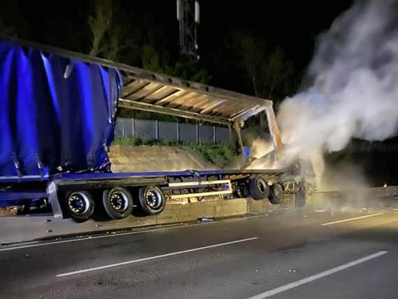 One lorry caught fire after mounting the central reservation barrier