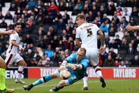 Cody Cropper in action for MK Dons