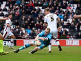 Cody Cropper in action for MK Dons