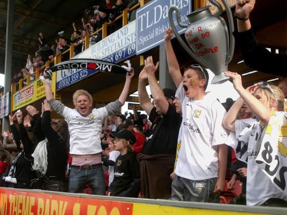 Dons fans celebrate at Valley Parade