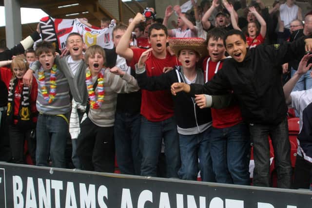 Dons fans celebrate at Valley Parade