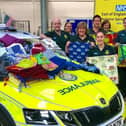 Frontline staff receiving the new scrubs