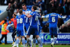 Alex Gilbey, then at Colchester, celebrates at full-time in their win over Preston