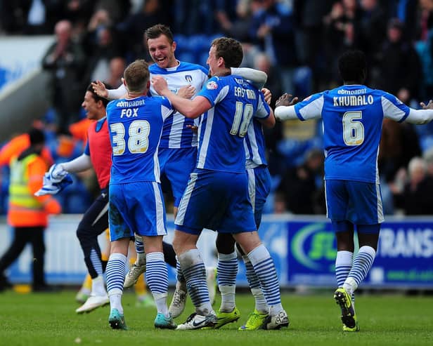 Alex Gilbey, then at Colchester, celebrates at full-time in their win over Preston
