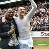 Dele Alli celebrates with Benik Afobe