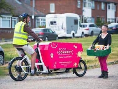 Food parcels are delivered by e-bike