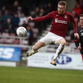 Northampton's Ryan Watson and Exeter's Brennan Dickenson - both played for Dons previously.