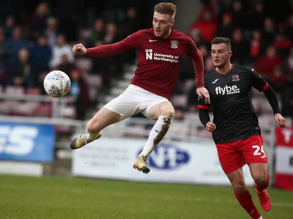 Northampton's Ryan Watson and Exeter's Brennan Dickenson - both played for Dons previously.