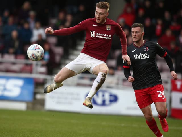 Northampton's Ryan Watson and Exeter's Brennan Dickenson - both played for Dons previously.
