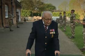 Captain Tom walks his 100th lap of his garden