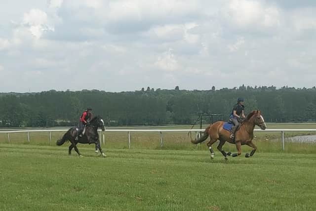 Vicki Anderton and Louisa Carson enjoy a run round Towcester Racecourse