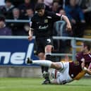 Miguel Llera in action for Dons against Northampton