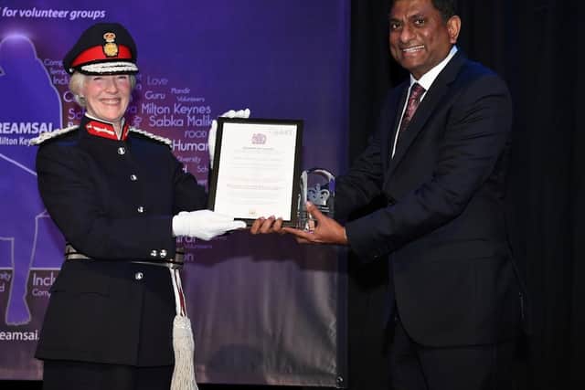 The award was signed by the Queen