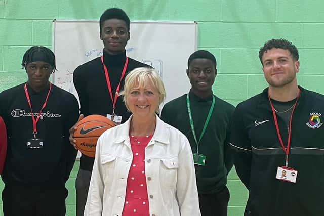 Cllr Zoe Nolan with some of the basketball team