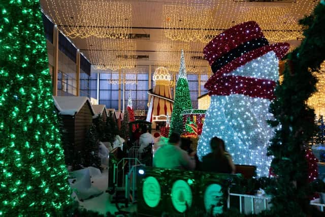 The popular Chistmas display at centre:mk features festive train rides, a Victorian carousel, and vintage helter-skelter