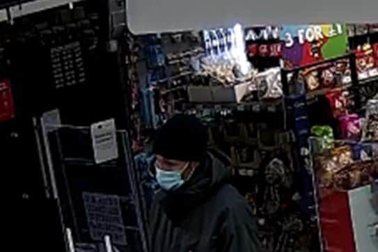 Do you recognise this man police want to speak to in connection with robbery in Bletchley