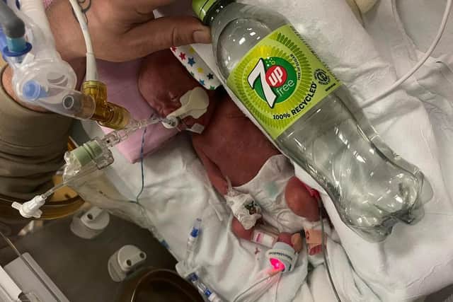 Little Lily has double in size - but is still smaller than this bottle