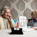 Game on, as Charlie Pelling, 8, takes on 97- year-old word fan Ruby Hill in the ultimate generation game