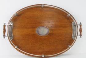 The oak galleried tray, complete with engraved presentation plaque, is on sale at auctioneers Humbert & Ellis