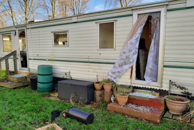 The door was smashed on this caravan